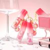 ✨ لیپ‌ گلاس مینی آویزدار HUDAMOJI (Strawberry Juicy Lip)